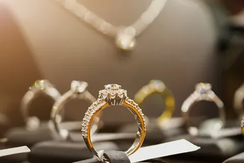 Jewellery diamond rings and necklaces show in luxury retail store window display